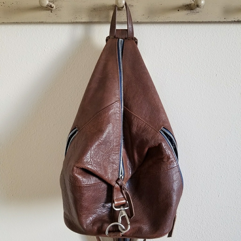 Brown leather backpack convertible to sling bag